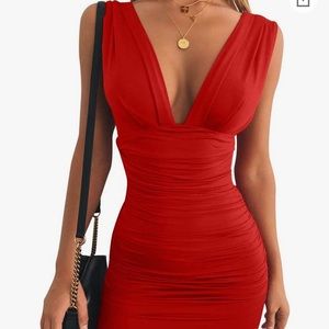Red bodycon sleeveless ruched mini dress
